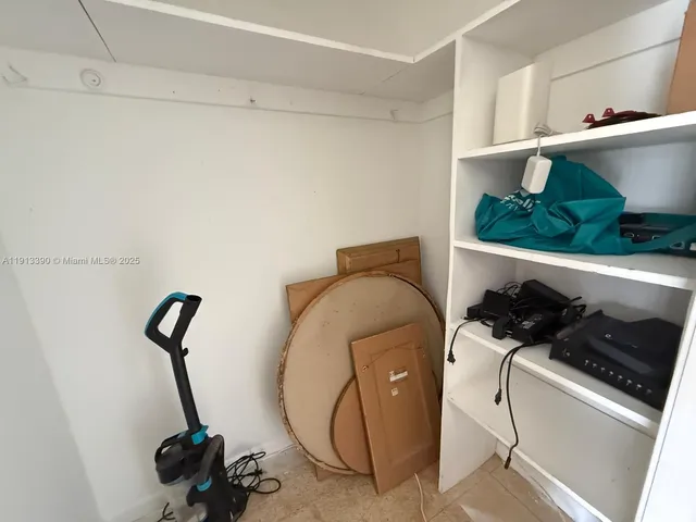 a room with storage and utility