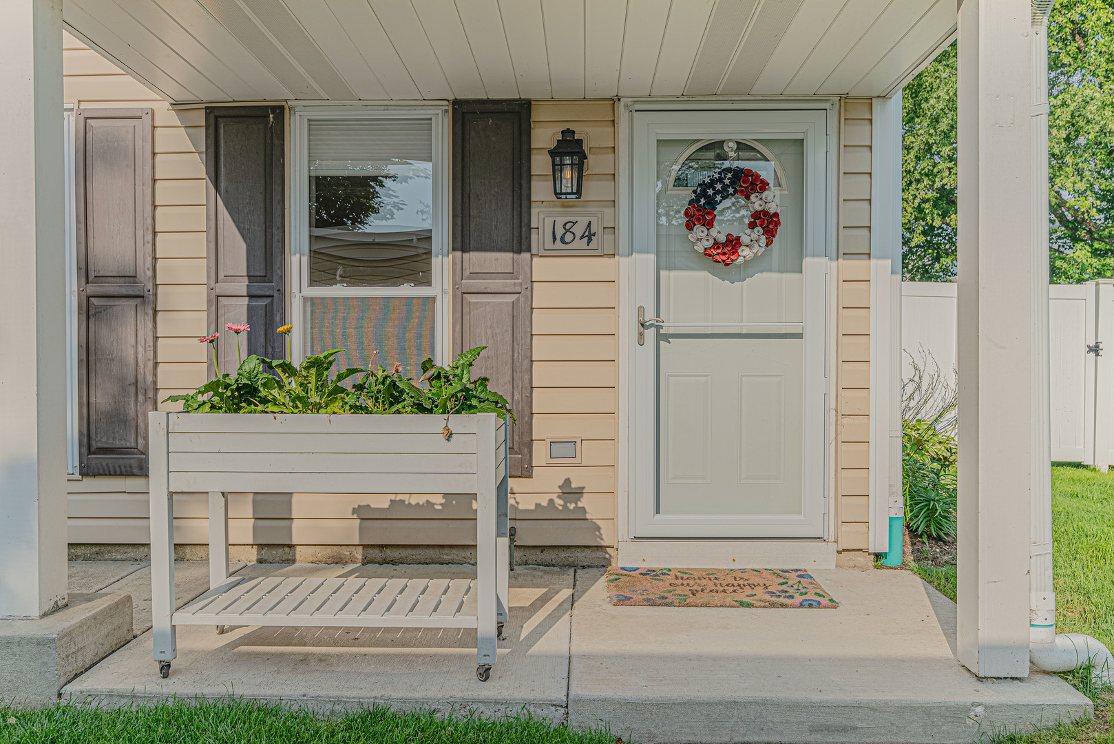 184 Rodenburg Road Roselle, IL 60172 - Photo 2 of 29 a front view of a house with a porch