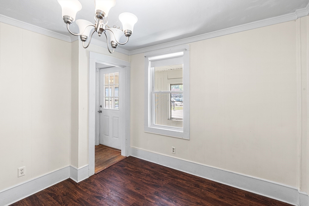 13 Maple Street Easthampton, MA 01027 - Photo 14 of 36 wooden floor in an empty room with a window