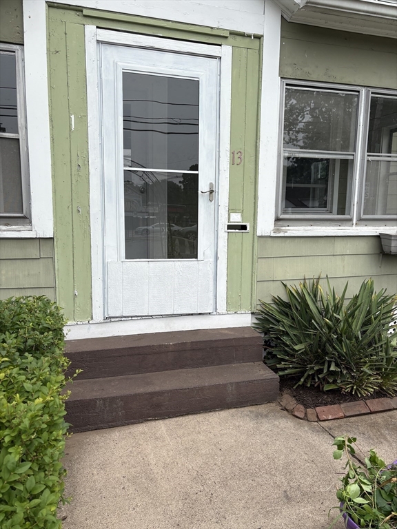 13 Maple Street Easthampton, MA 01027 - Photo 33 of 36 a front view of a house with a yard