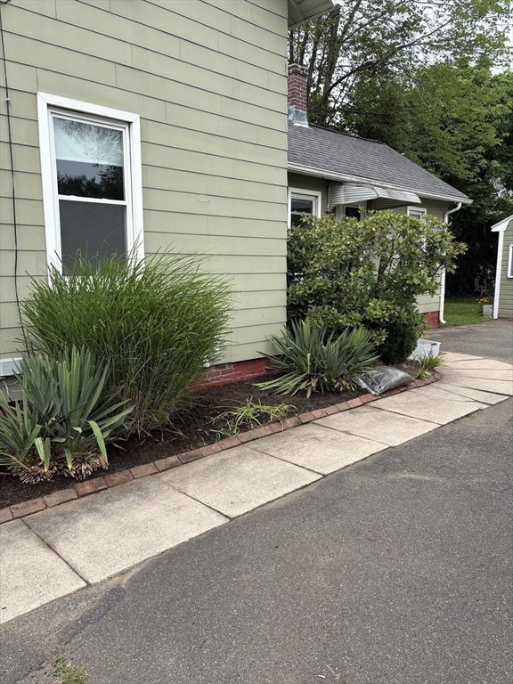 13 Maple Street Easthampton, MA 01027 - Photo 35 of 36 a view of a house with a yard