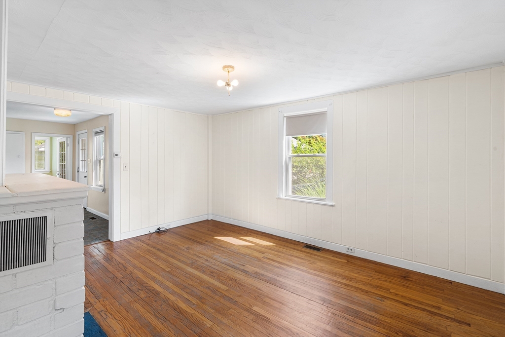 13 Maple Street Easthampton, MA 01027 - Photo 6 of 36 a bedroom with a bed and a window