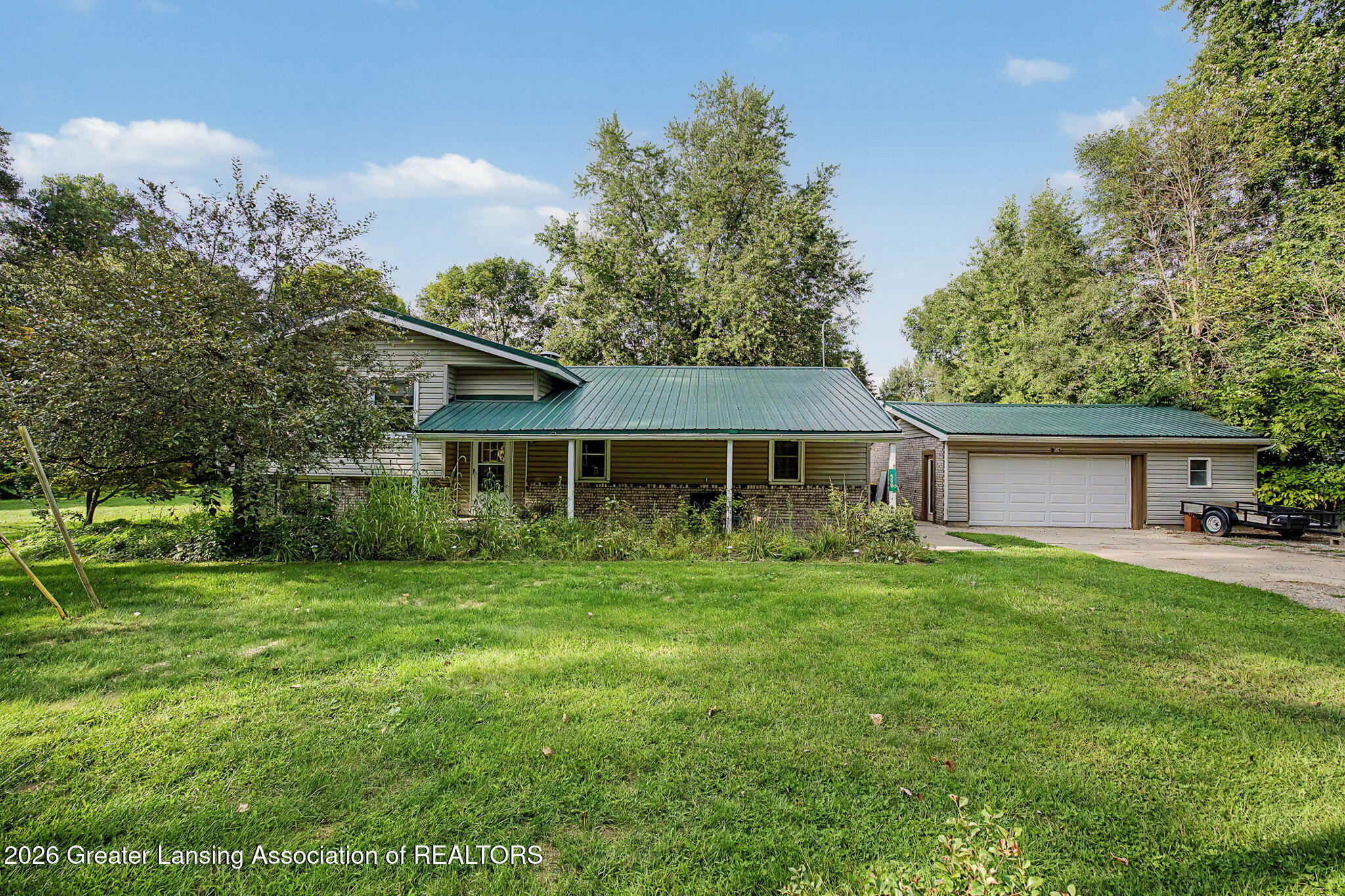 599 Gaskill Road Hastings, MI 49058 - Photo 2 of 44 Front w/Garage