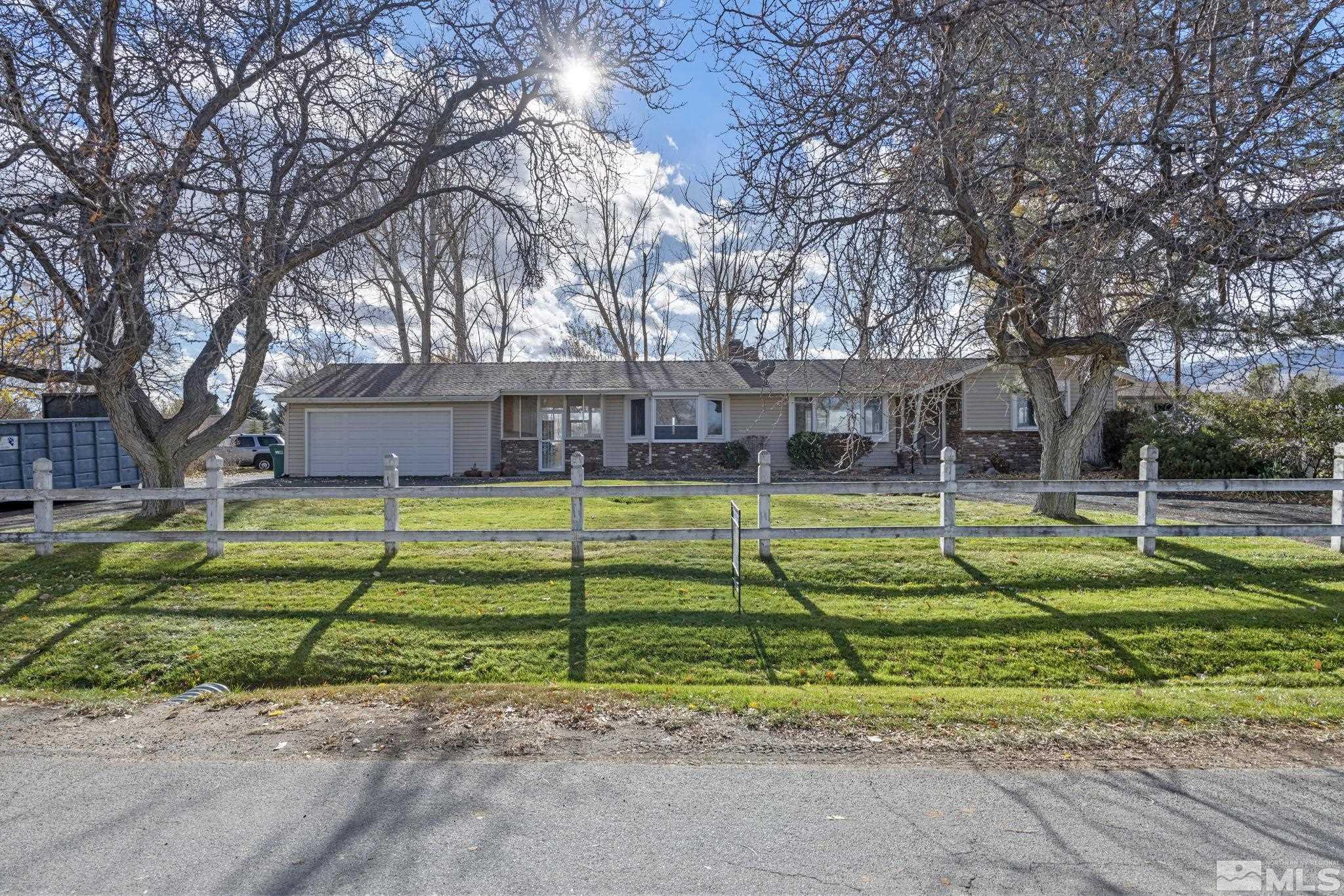 1631 Eli Drive Reno, NV 89511 - Photo 1 of 40 a view of a house with a yard