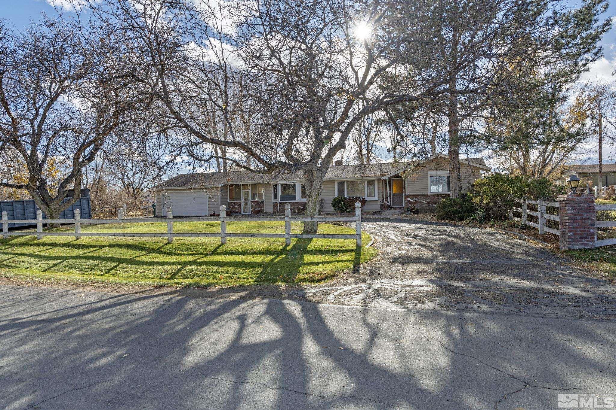1631 Eli Drive Reno, NV 89511 - Photo 2 of 40 a view of house with swimming pool and yard
