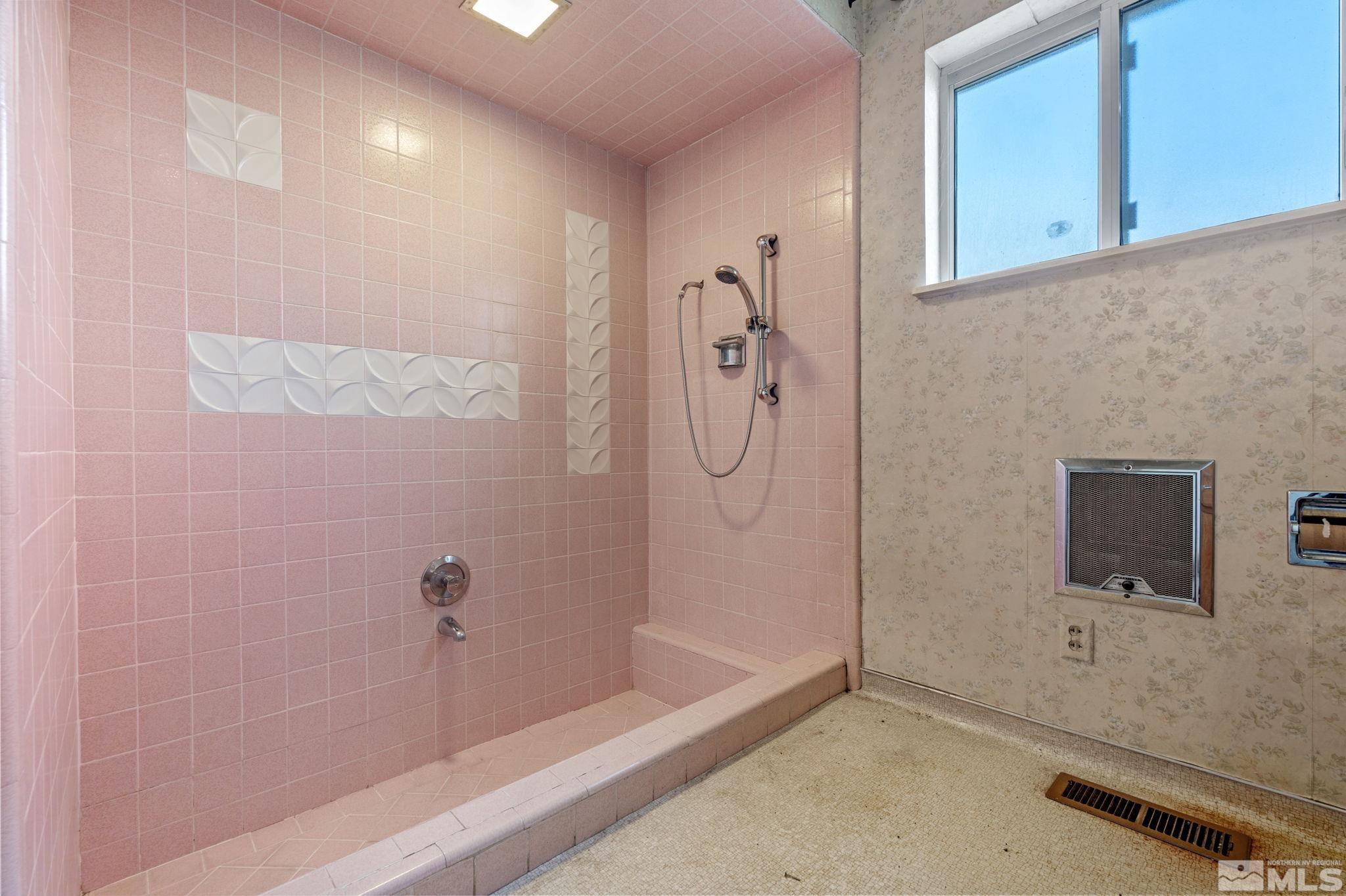 1631 Eli Drive Reno, NV 89511 - Photo 25 of 40 a bathroom with a bathtub and a shower