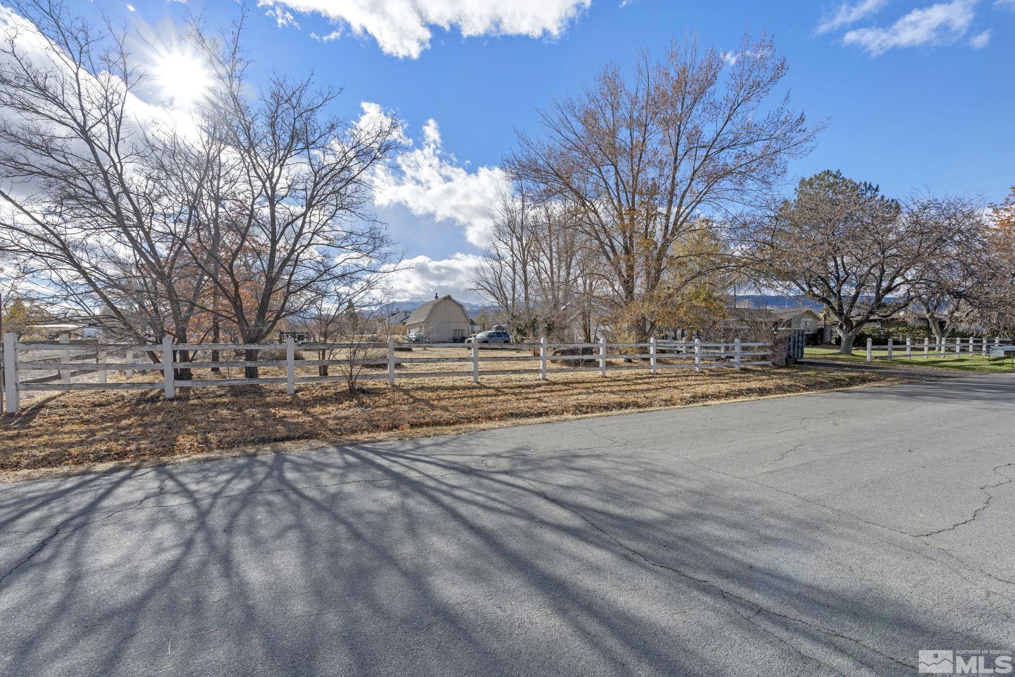 1631 Eli Drive Reno, NV 89511 - Photo 28 of 40 a view of road with with trees