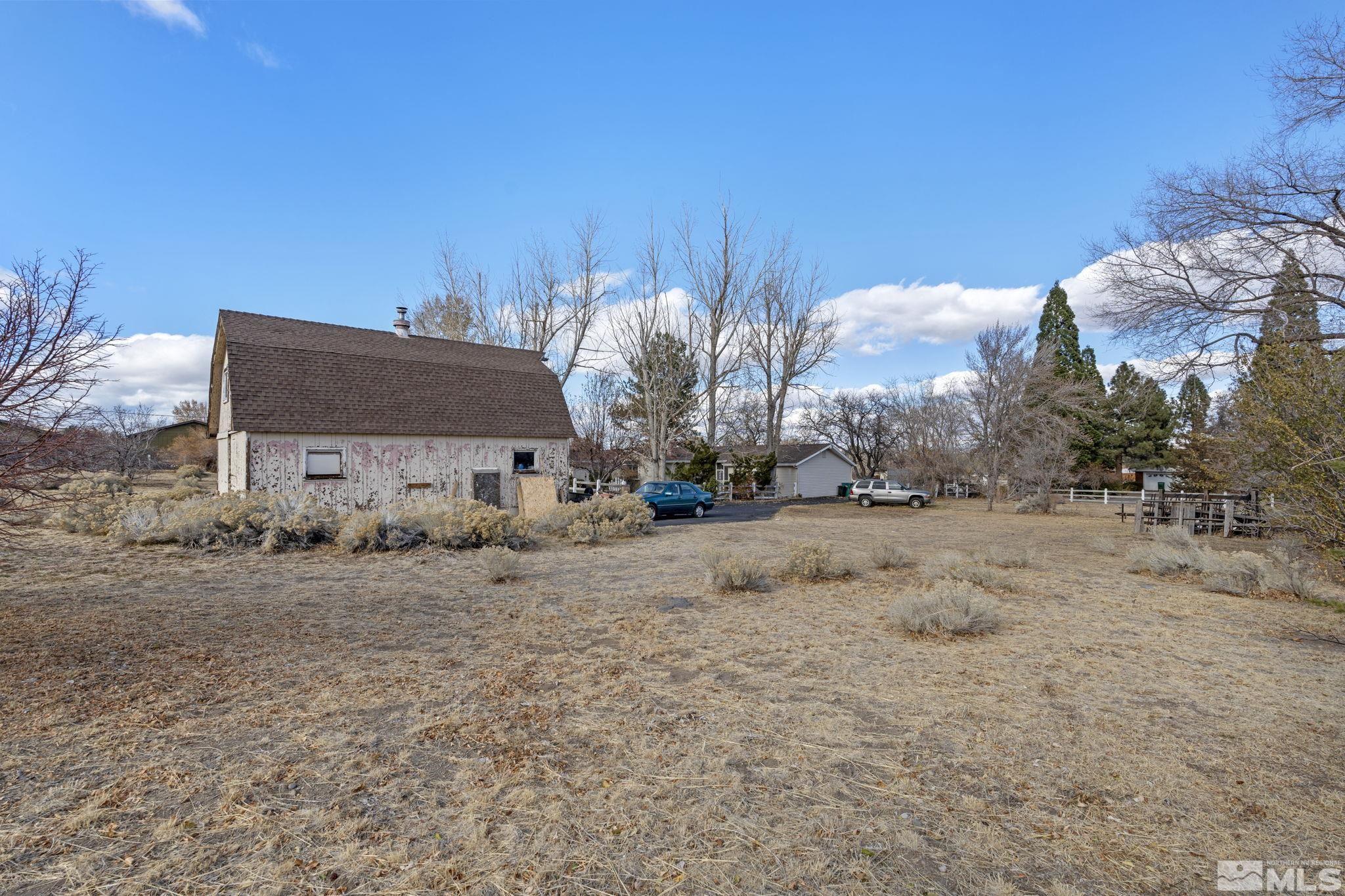 1631 Eli Drive Reno, NV 89511 - Photo 36 of 40 a view of house with a yard