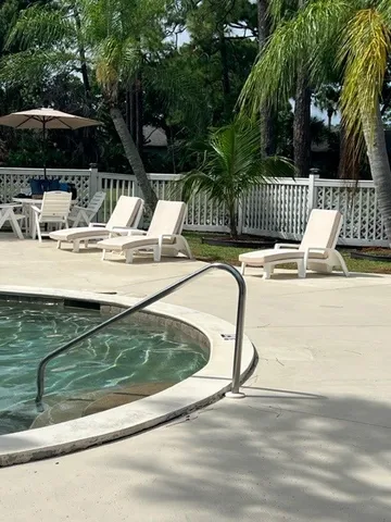 a sign that is on a brick wall