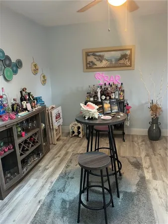 a view of a workspace with furniture