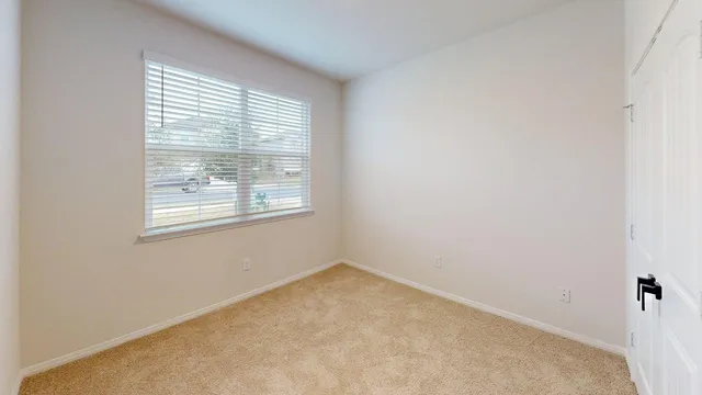 an empty room with a window