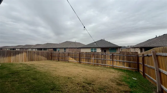 a view of a lake with a big yard
