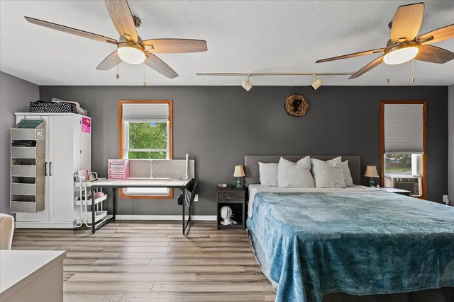 a bathroom with a toilet a sink and bathtub