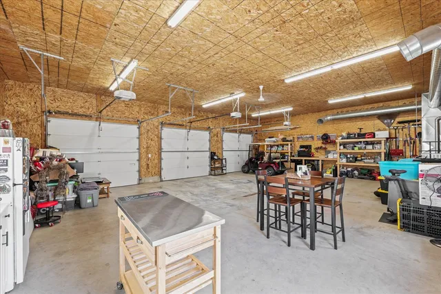 a view of a garage with cars