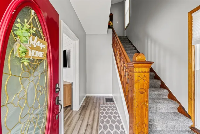 a view of stairs with sitting area