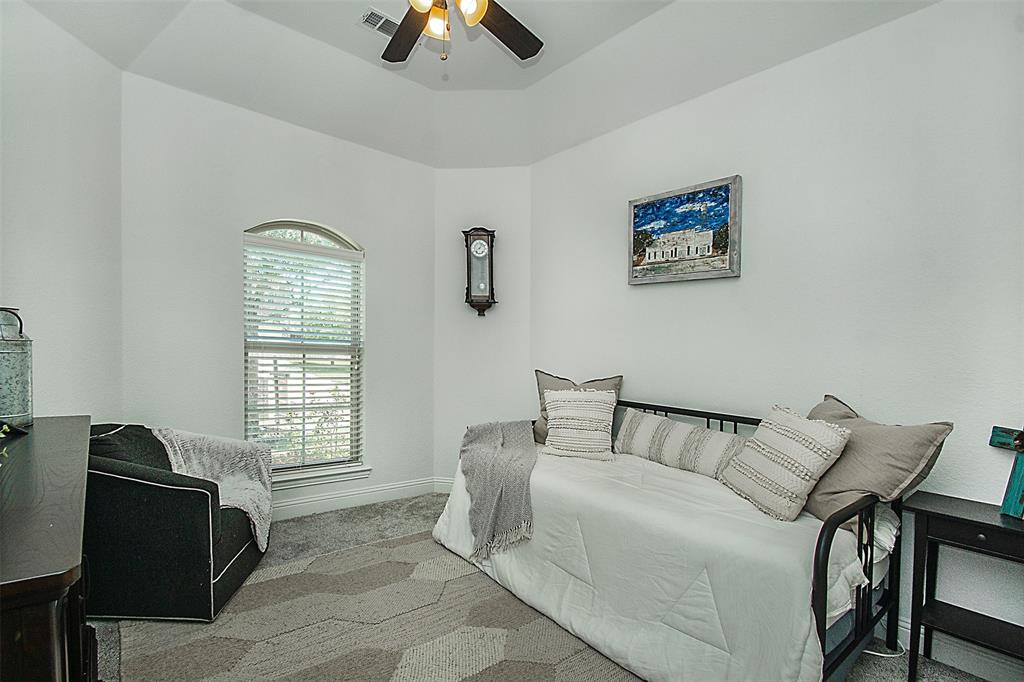 5809 Yellow Rose Court Midlothian, TX 76065 - Photo 17 of 33 Tray ceiling with ceiling fan and light fixture