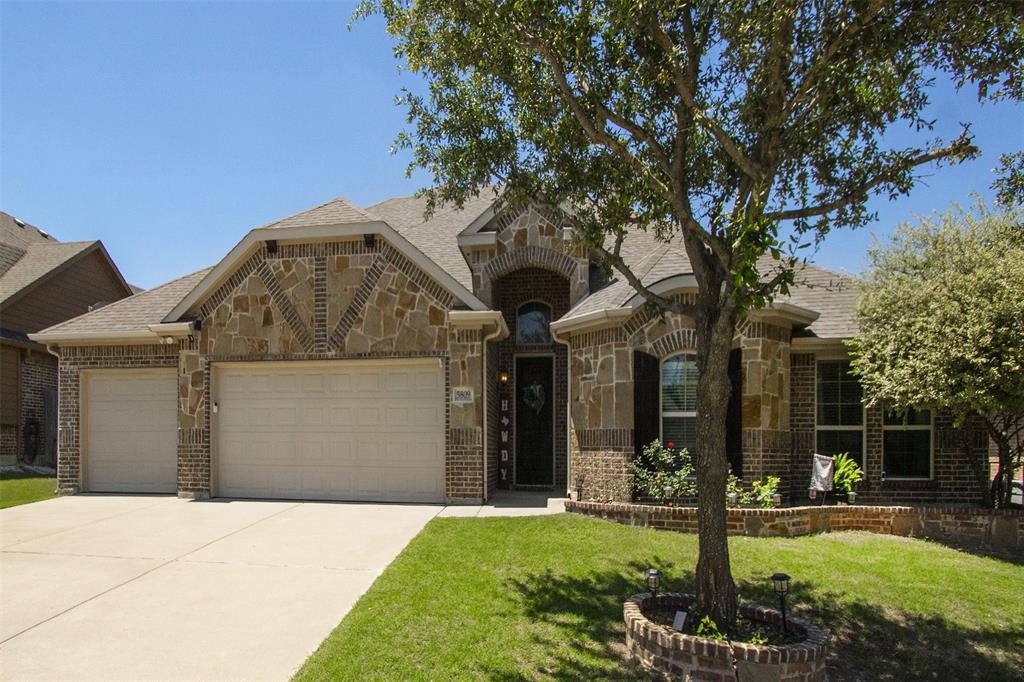 5809 Yellow Rose Court Midlothian, TX 76065 - Photo 3 of 33 Stone and brick facade with a two-car garage and a separate single-car garage