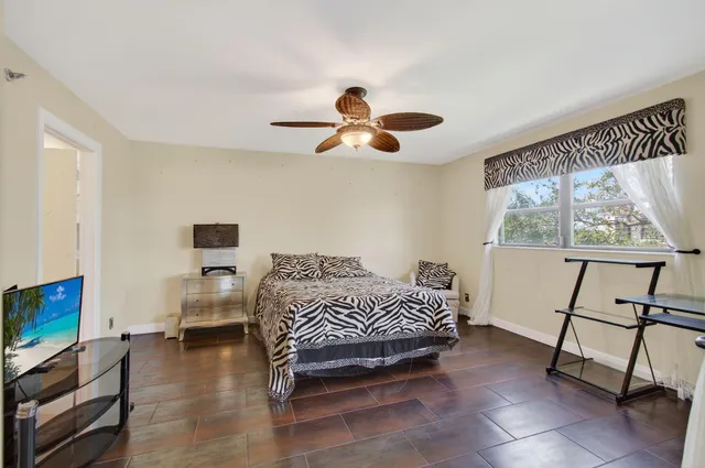 $150,000 | 7290 Kinghurst Drive, Unit 405, Delray Beach, FL 33446