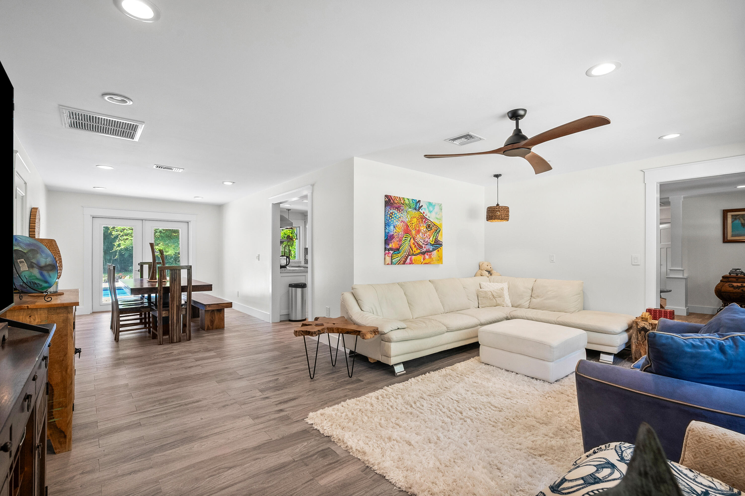 3 Mandalay Road Sewall's Point, FL 34996 - Photo 17 of 46 a living room with furniture and wooden floor