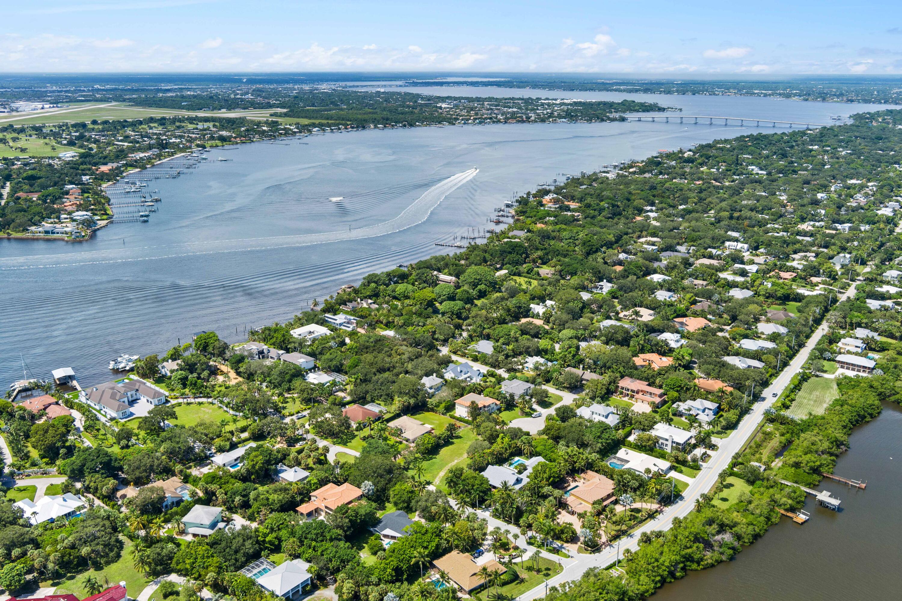 3 Mandalay Road Sewall's Point, FL 34996 - Photo 44 of 46 a view of a lake with a mountain