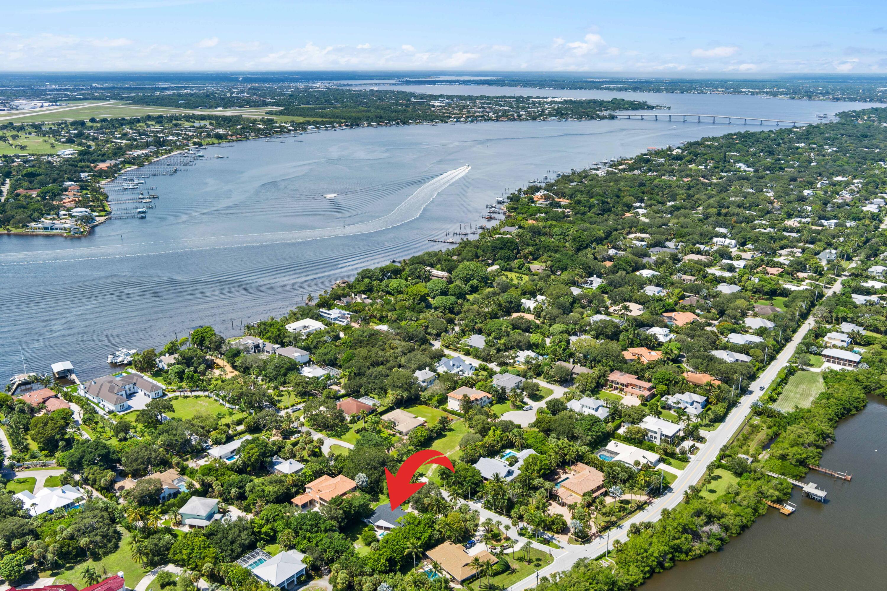 3 Mandalay Road Sewall's Point, FL 34996 - Photo 45 of 46 a view of a lake with a mountain