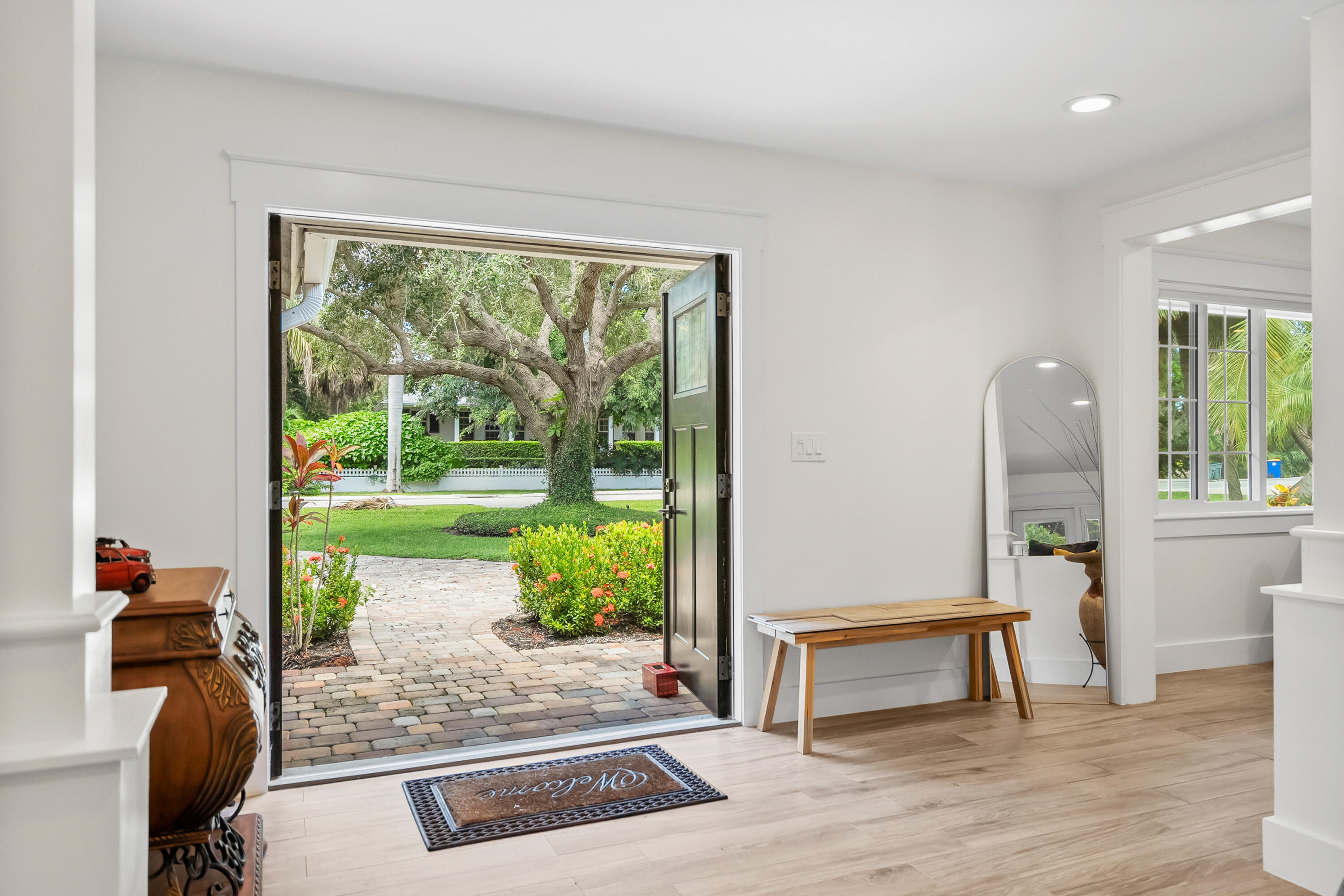 3 Mandalay Road Sewall's Point, FL 34996 - Photo 6 of 46 a living room with furniture and a window