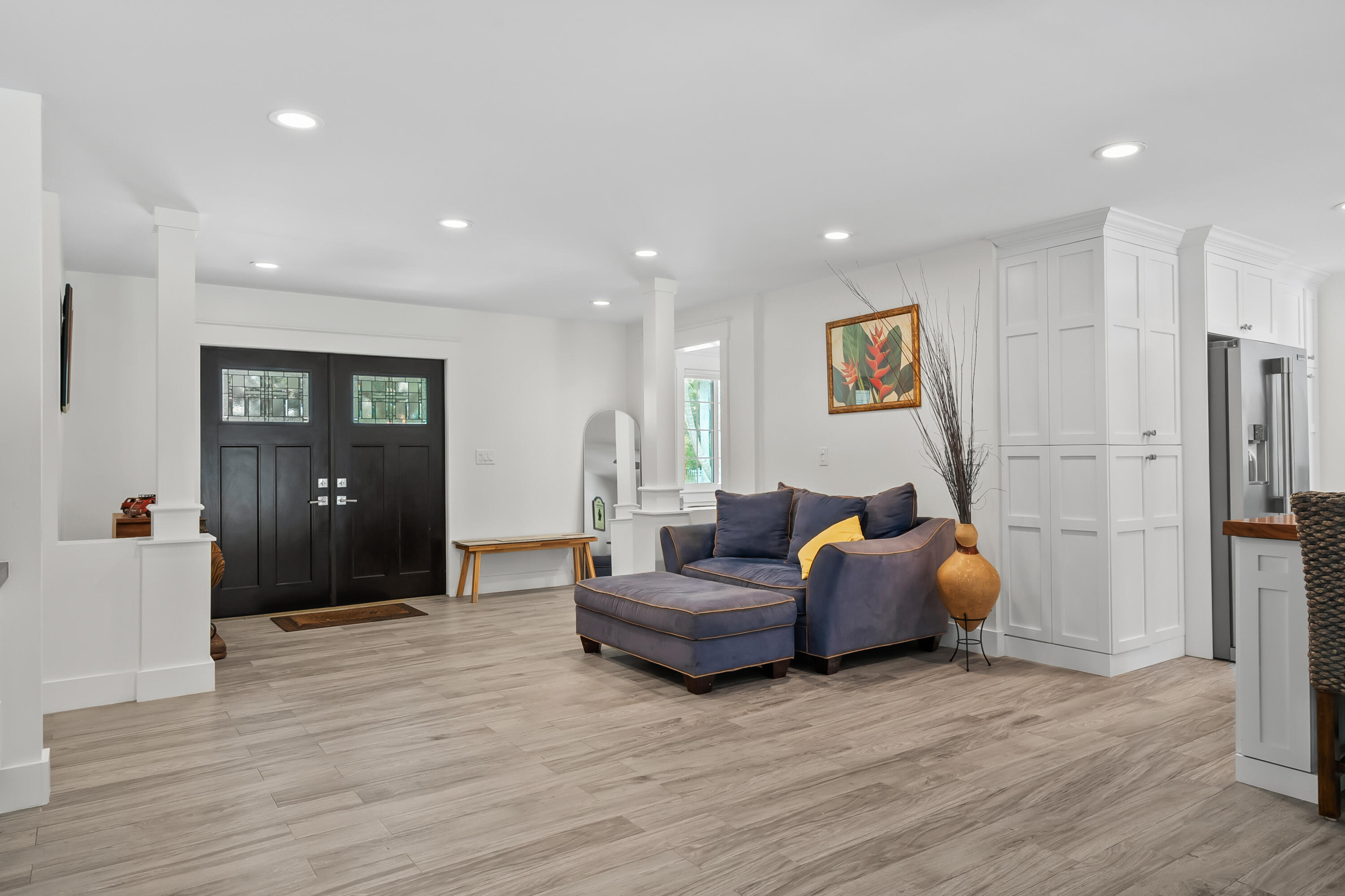 3 Mandalay Road Sewall's Point, FL 34996 - Photo 8 of 46 a living room with furniture and wooden floor