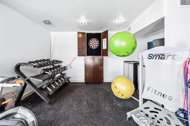 a view of a room with gym equipment