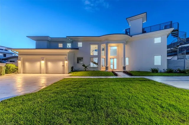 a view of a house with a back yard