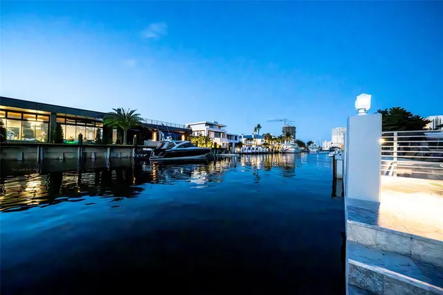 a view of a swimming pool with seating area