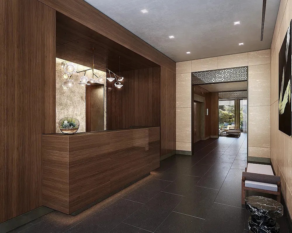 39 West 23rd Street, Unit 9B Manhattan, NY 10010 - Photo 11 of 16 a hallway with a large mirror and furniture