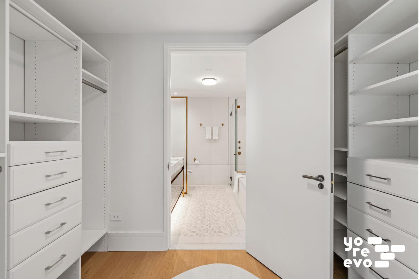 39 West 23rd Street, Unit 9B Manhattan, NY 10010 - Photo 7 of 16 a bathroom with a tub shower vanity and a sink