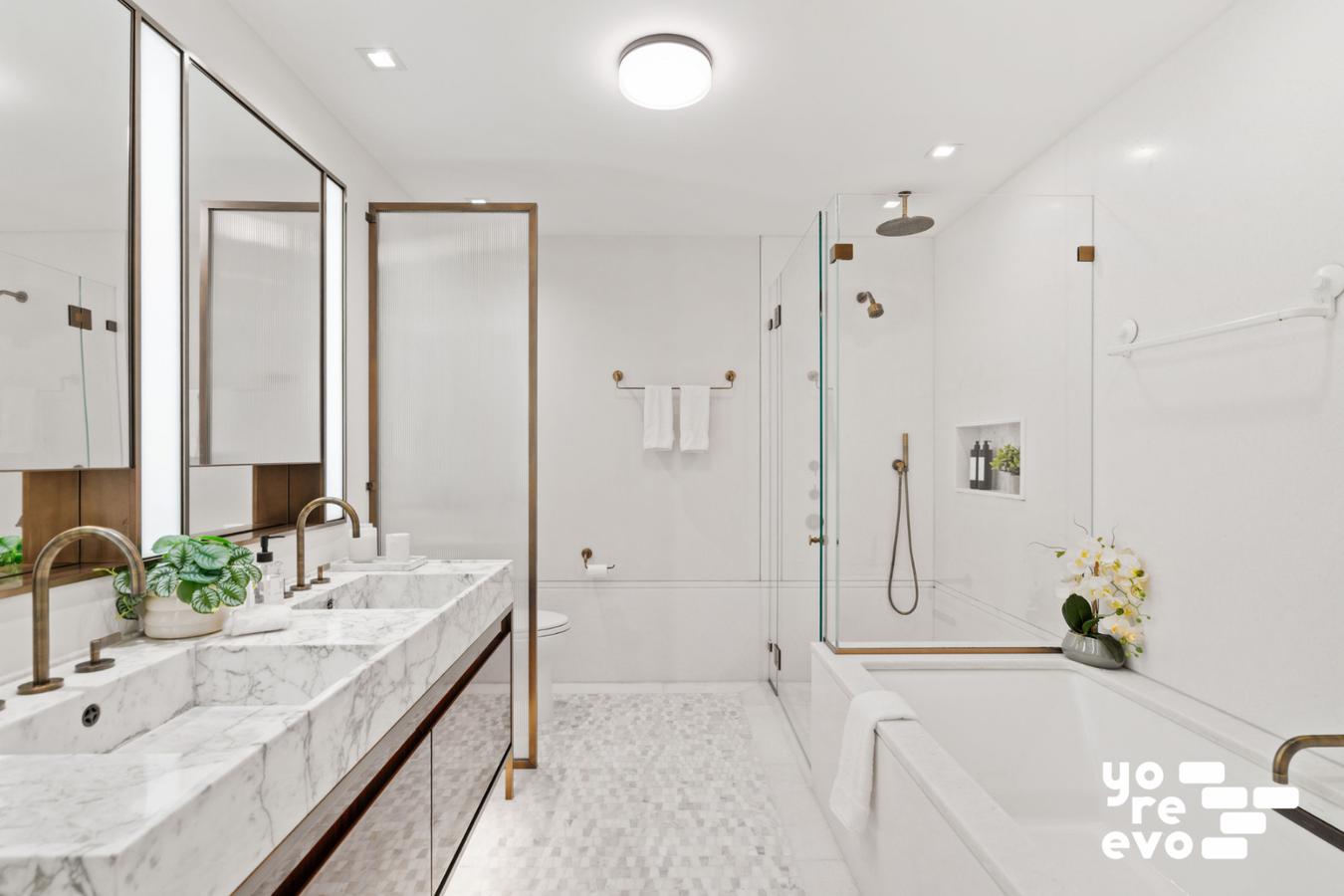 39 West 23rd Street, Unit 9B Manhattan, NY 10010 - Photo 8 of 16 a bathroom with a tub sink and mirror