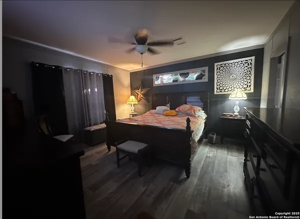 a bed room with a bed and a window