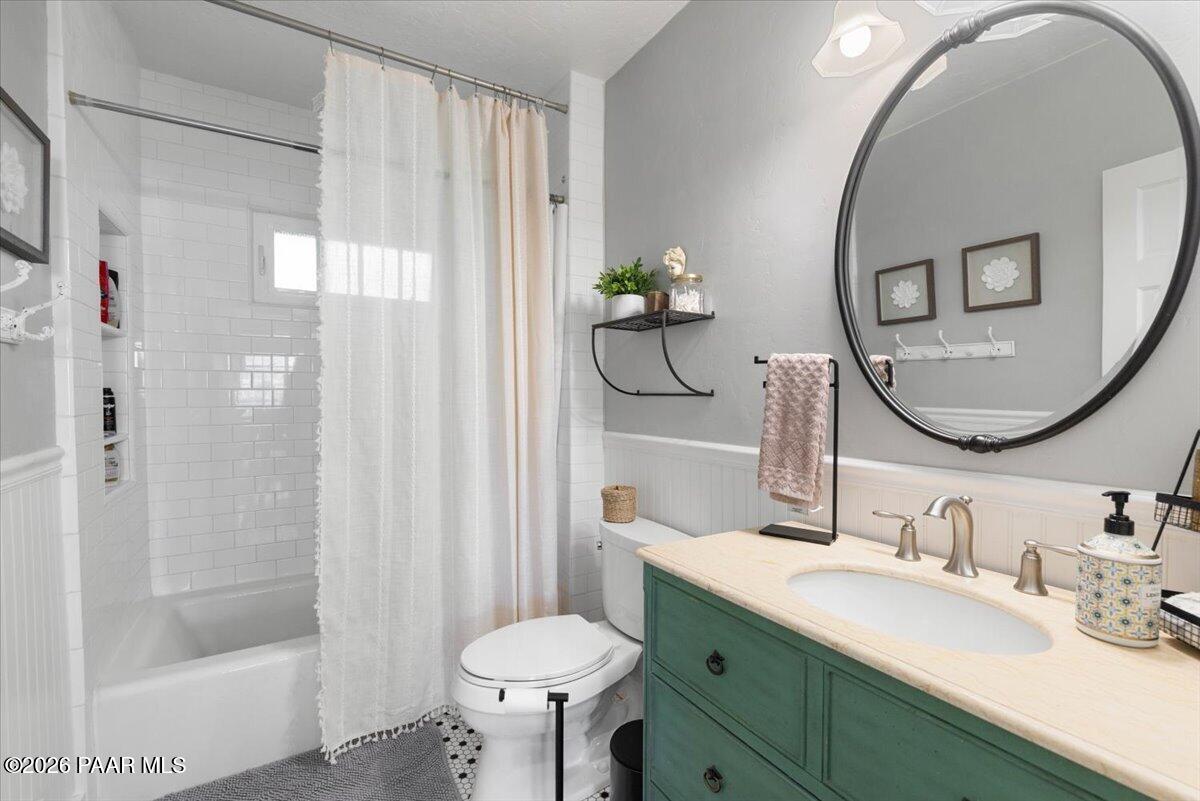 145 South Washington Street Prescott, AZ 86303 - Photo 14 of 39 a bathroom with a sink toilet and shower