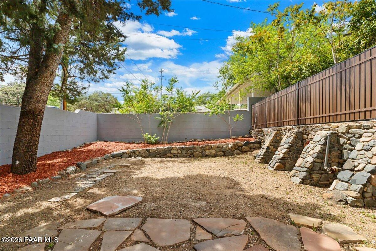 145 South Washington Street Prescott, AZ 86303 - Photo 24 of 39 a view of a backyard of the house