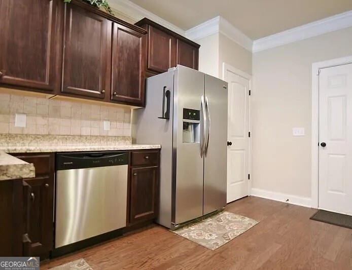 157 Putters Drive Athens, GA 30607 - Photo 13 of 24 a kitchen with stainless steel appliances granite countertop a refrigerator and a sink