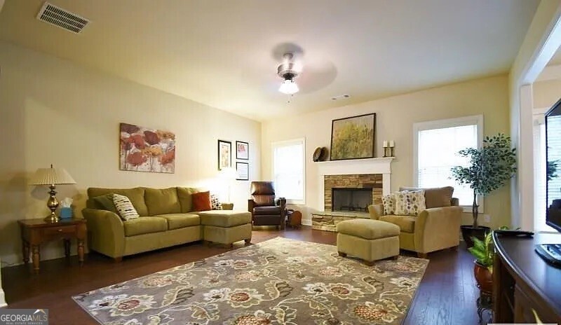 157 Putters Drive Athens, GA 30607 - Photo 2 of 24 a living room with furniture and a fireplace