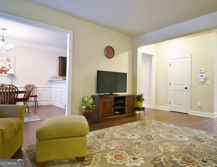 157 Putters Drive Athens, GA 30607 - Photo 21 of 24 a living room with furniture and a flat screen tv