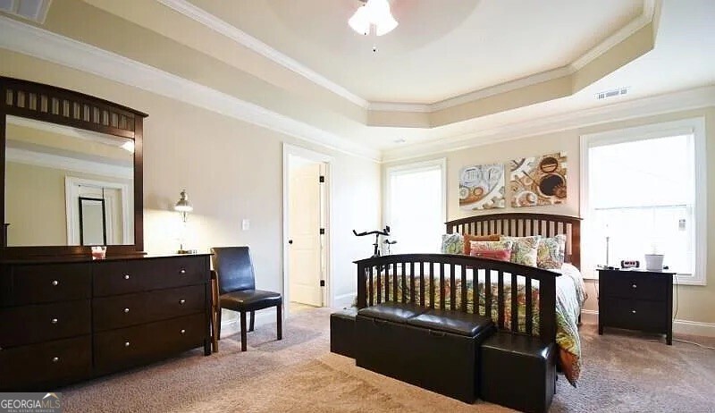 157 Putters Drive Athens, GA 30607 - Photo 8 of 24 a bedroom with a bed and a dresser