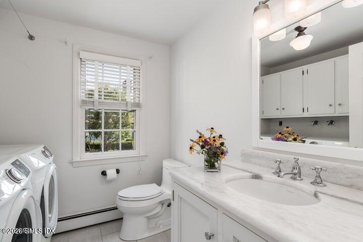 14 Shoal Point Lane Riverside, CT 06878 - Photo 17 of 30 powder room and laundry