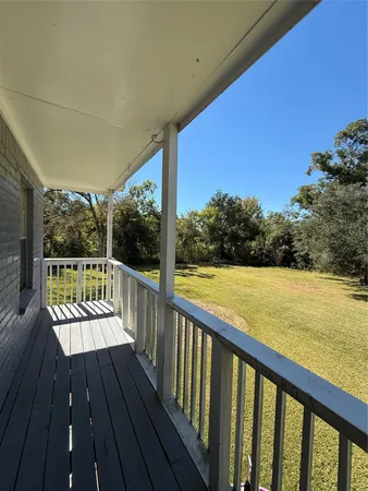 a view of balcony with couches