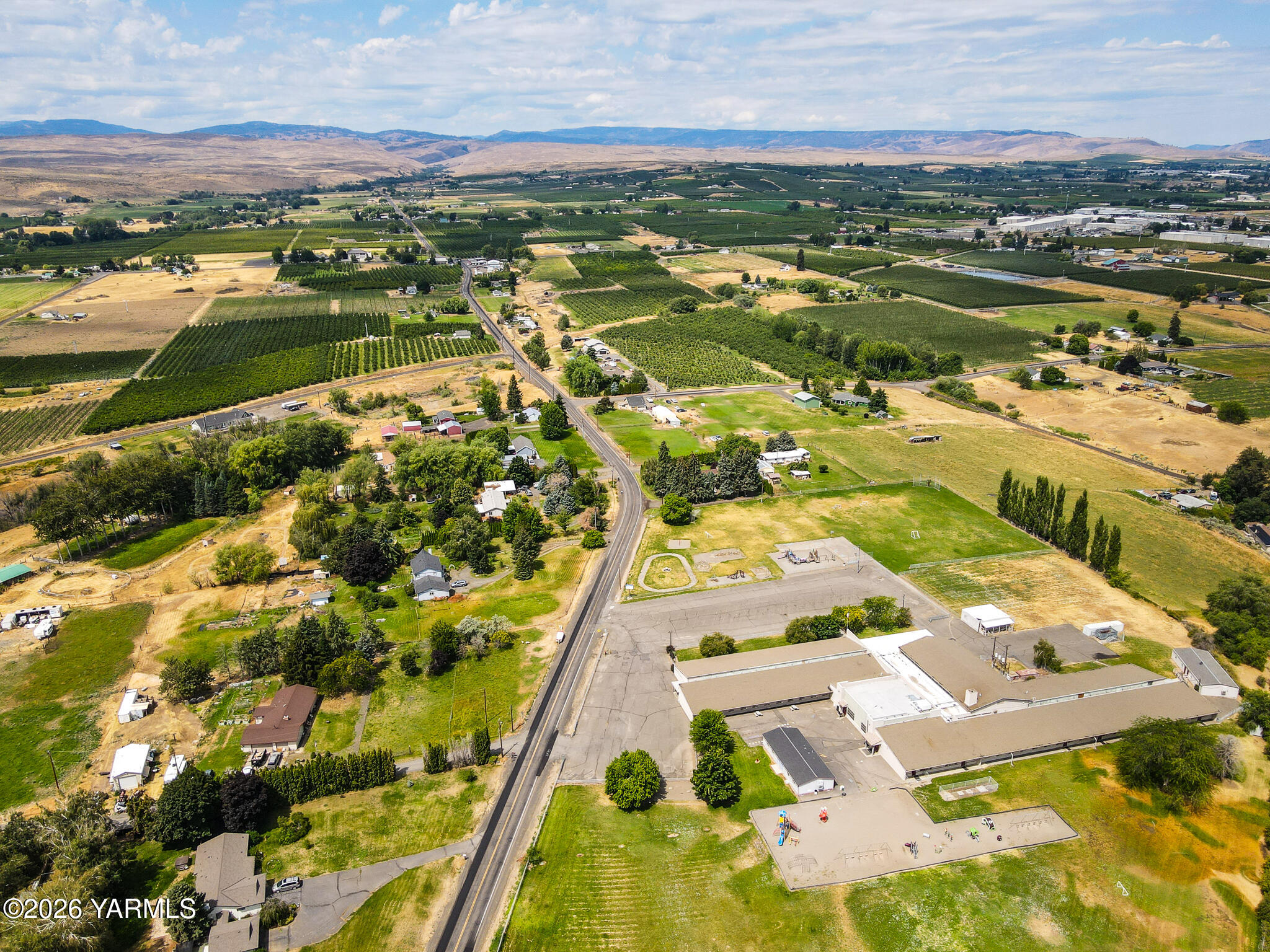 1130 Thompson Road Cowiche, WA 98923 - Photo 23 of 25 an aerial view of residential houses with outdoor space