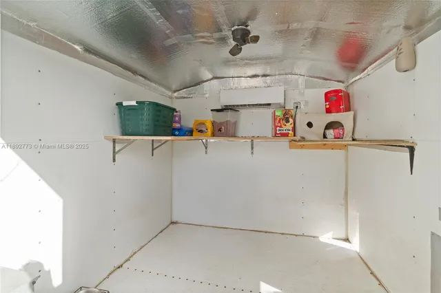 a view of storage and utility room