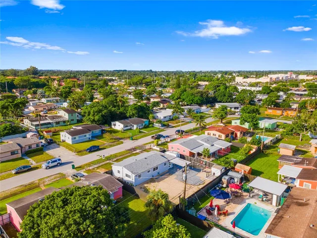 an aerial view of multiple house