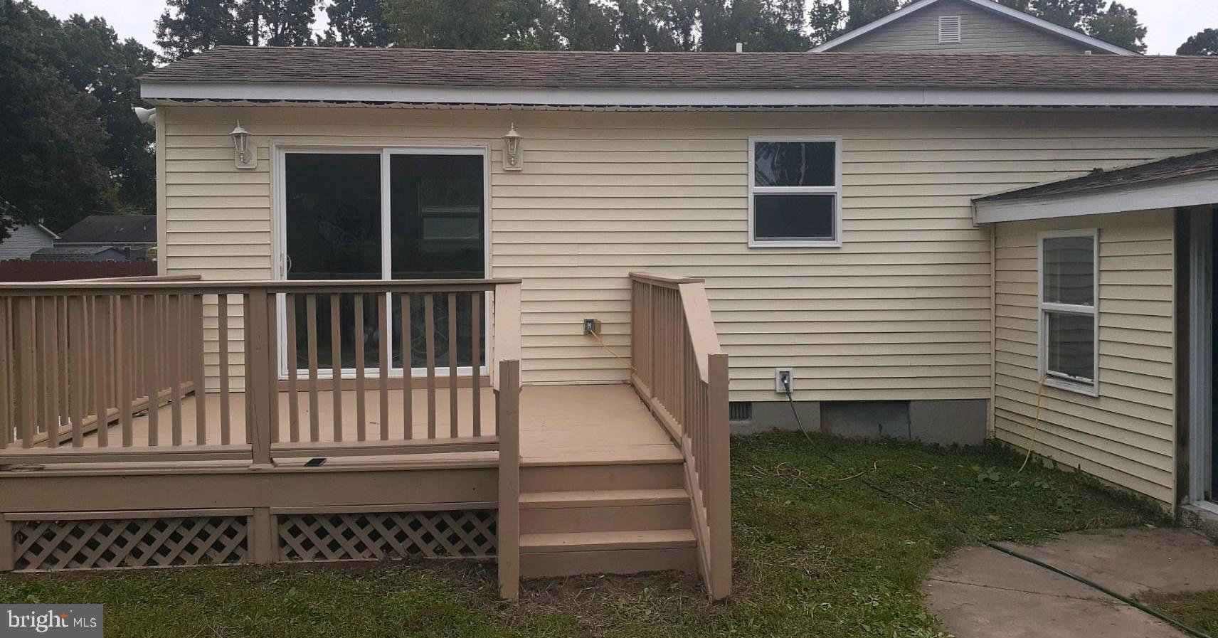 528 Rolando Drive Colonial Beach, VA 22443 - Photo 2 of 2 Rear of home, the backyard is HUGE with a shed.