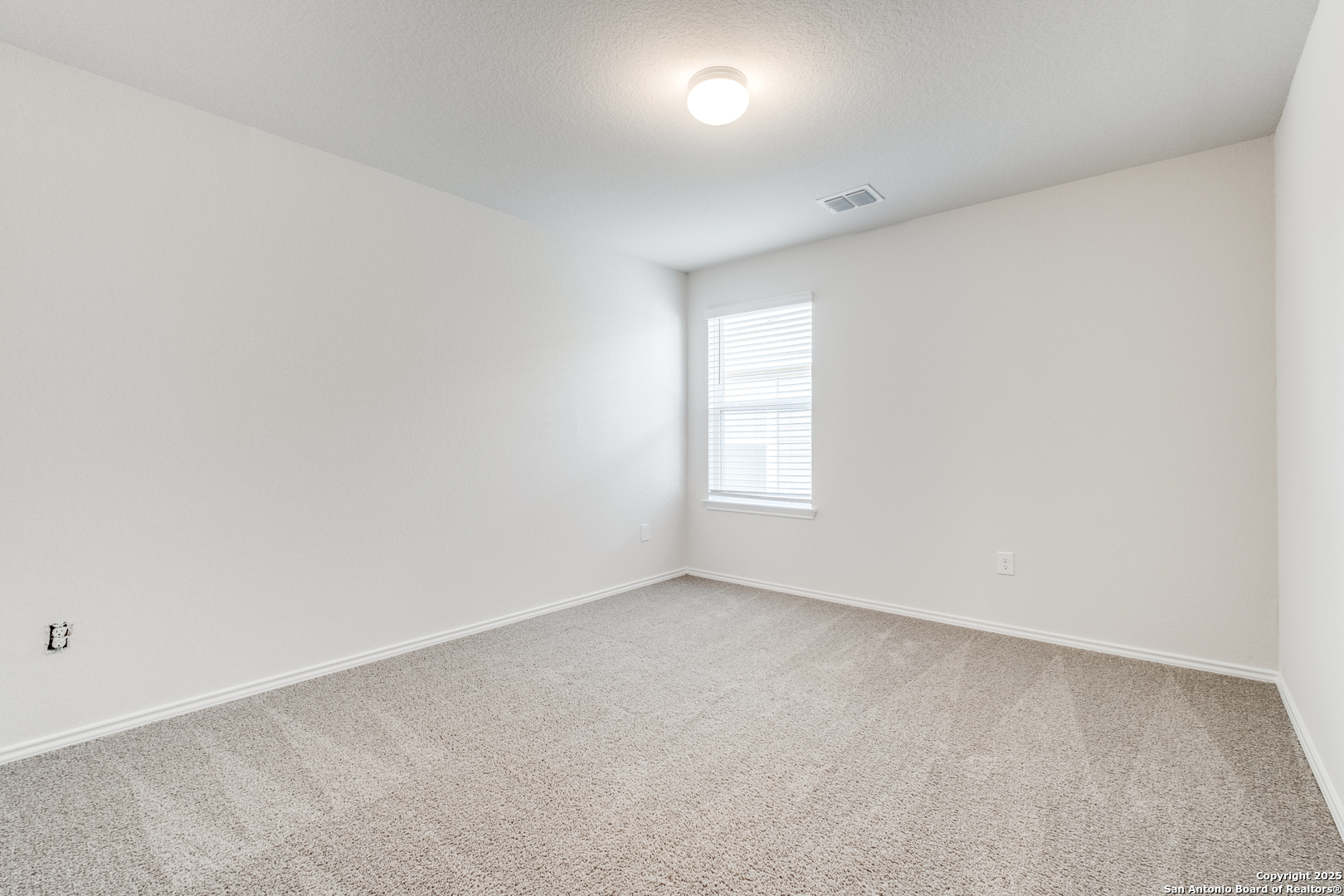 29523 Copper Gate Bulverde, TX 78163 - Photo 11 of 25 an empty room with windows