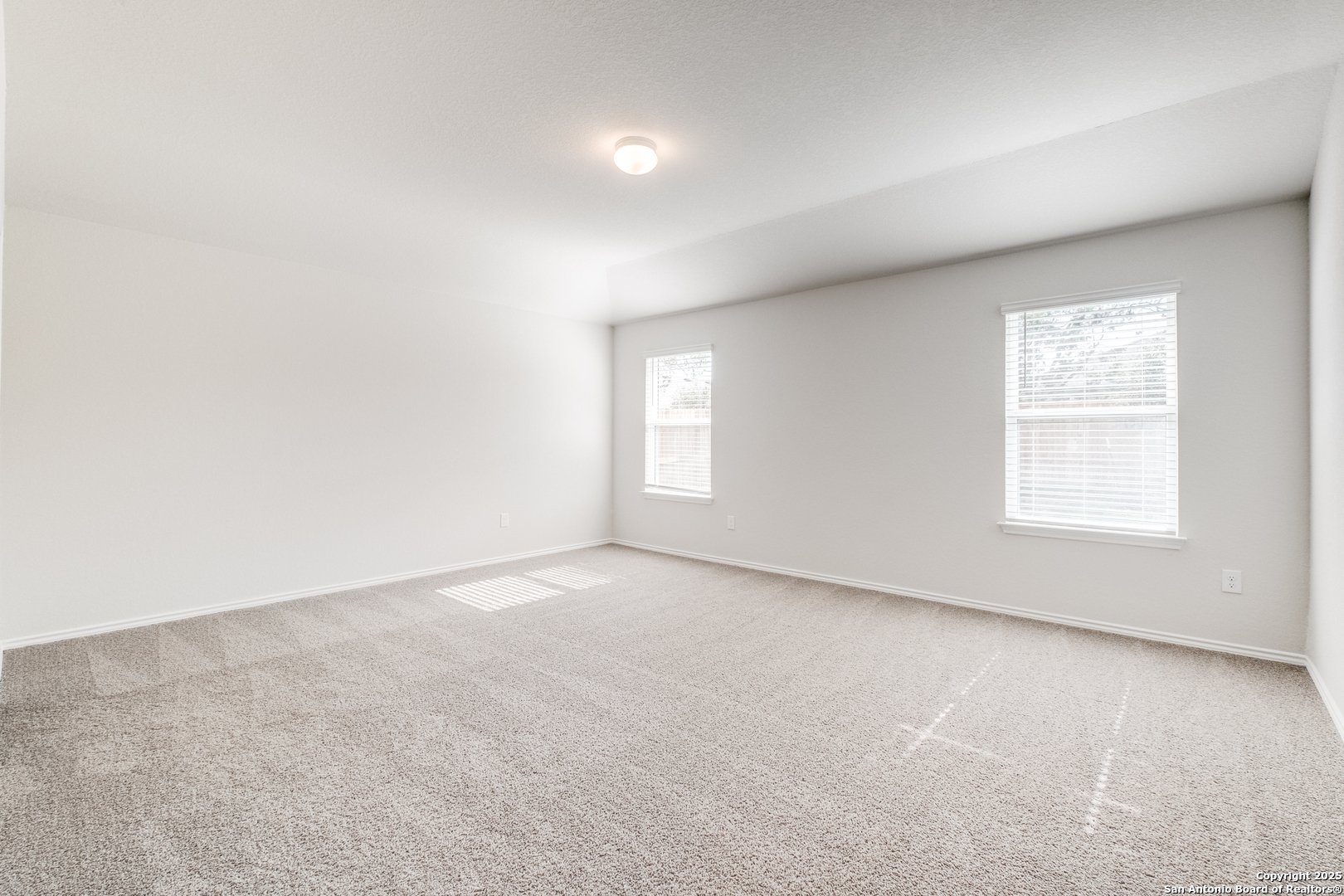 29523 Copper Gate Bulverde, TX 78163 - Photo 18 of 25 an empty room with windows