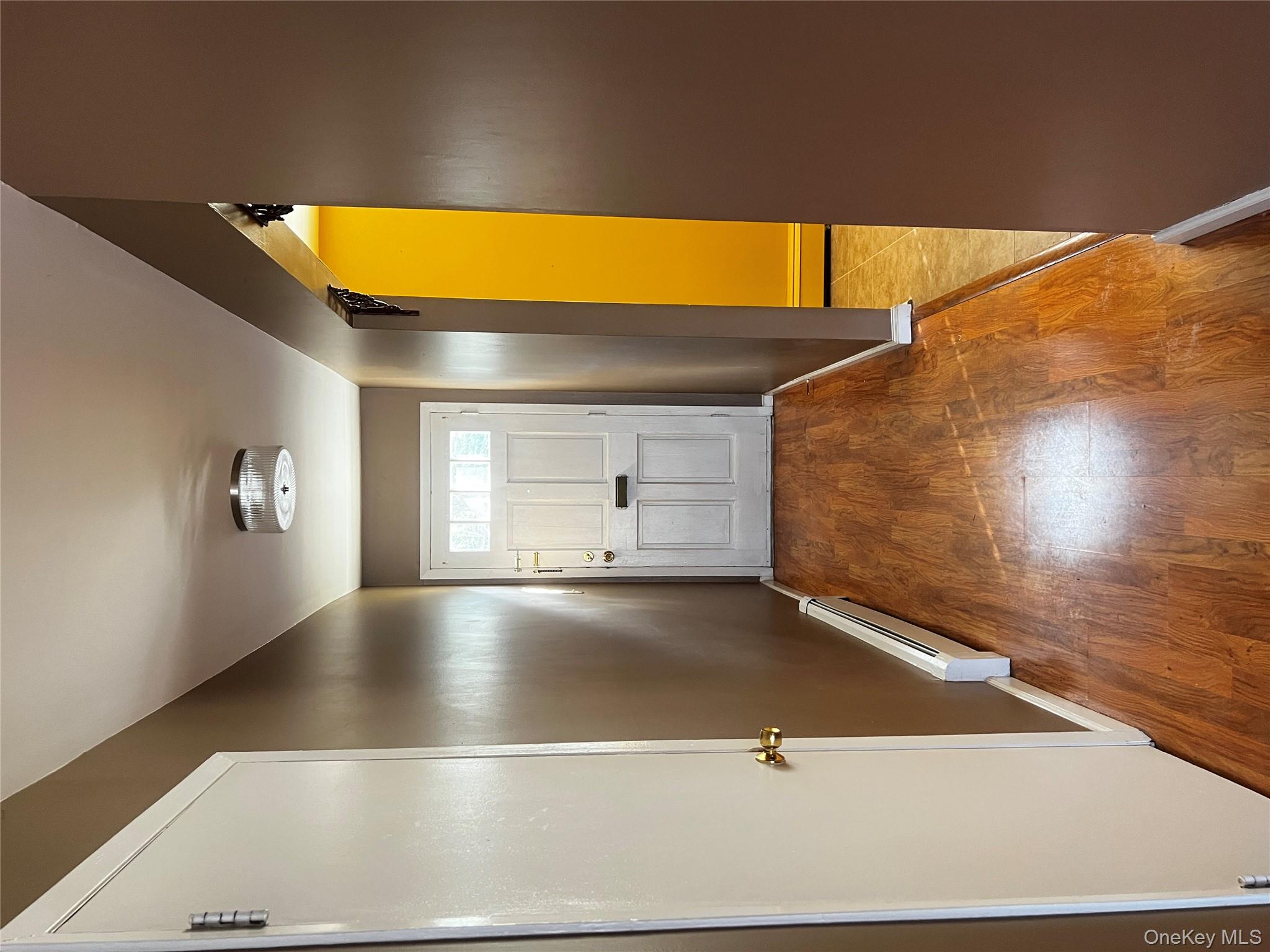 1840 Crompond Road, Unit 7C6 Peekskill, NY 10566 - Photo 4 of 16 a view of hallway with wooden floor
