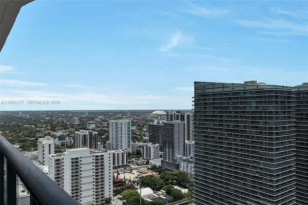 a view of a city with tall buildings